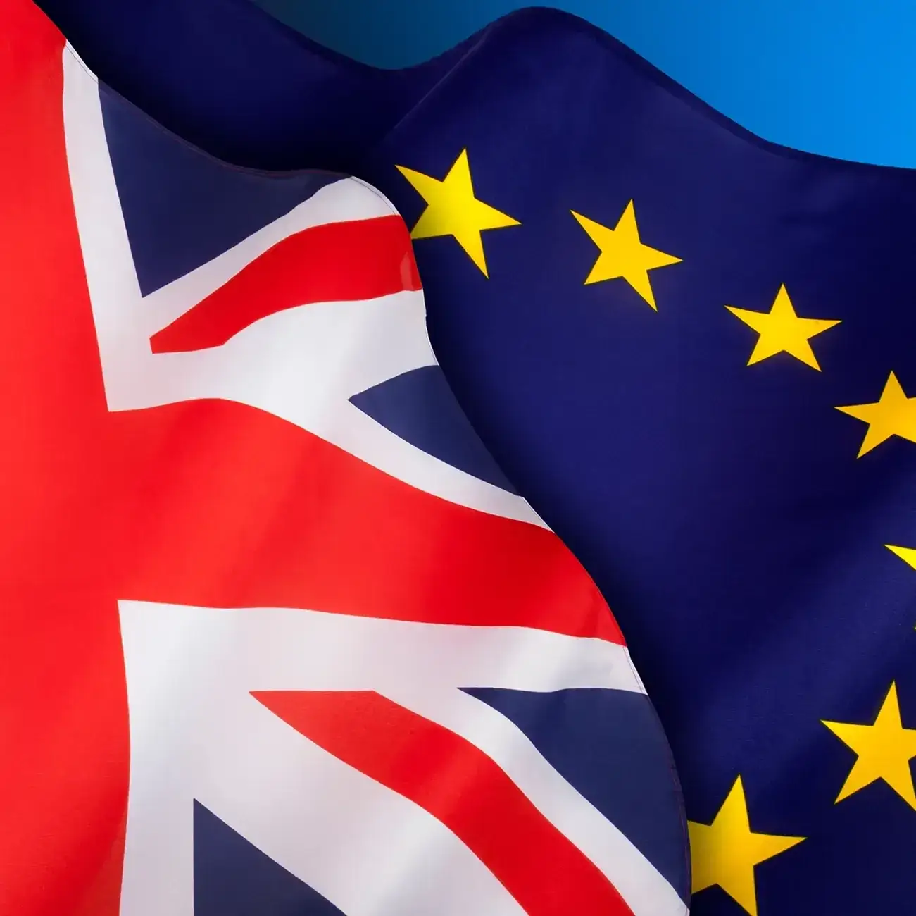 A close-up image showing the flags of the United Kingdom and the European Union overlapping